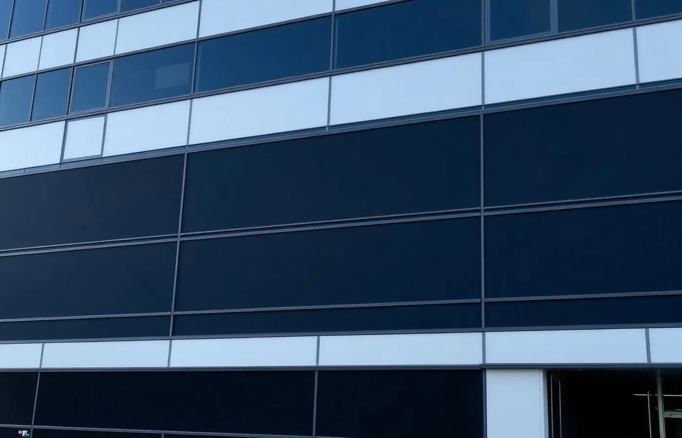 Building facade with blackout window film